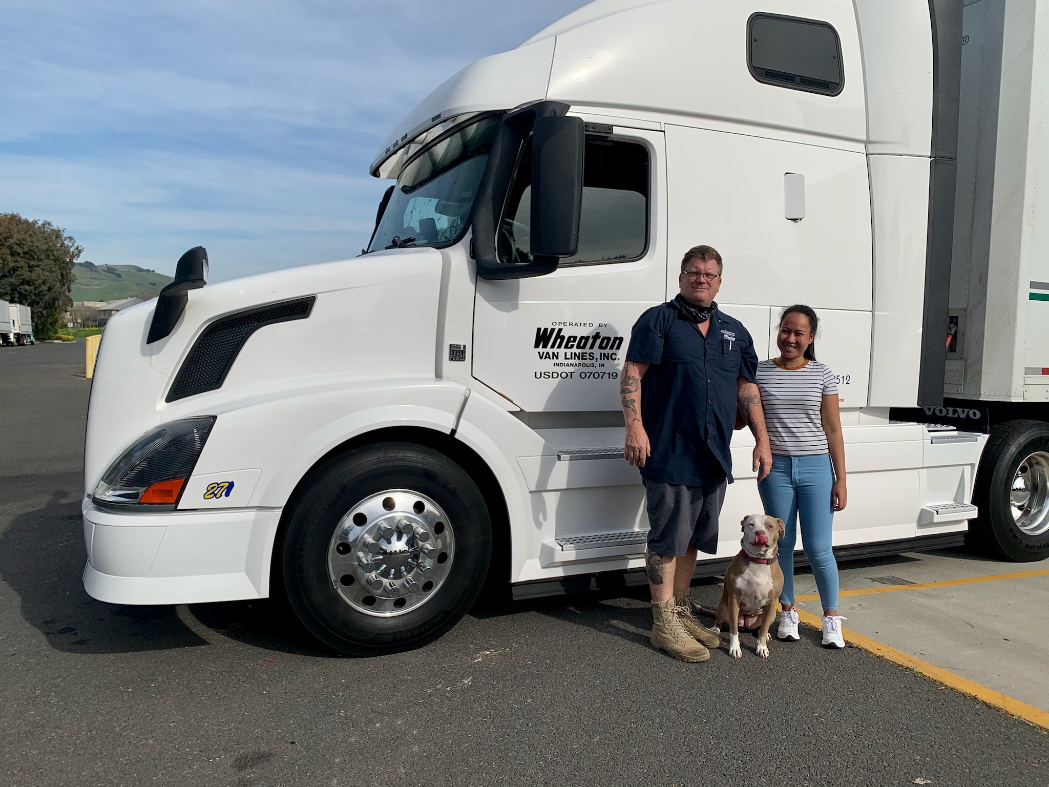 Our driver CJ, his wife Daisy, and their dog travel on the road together!