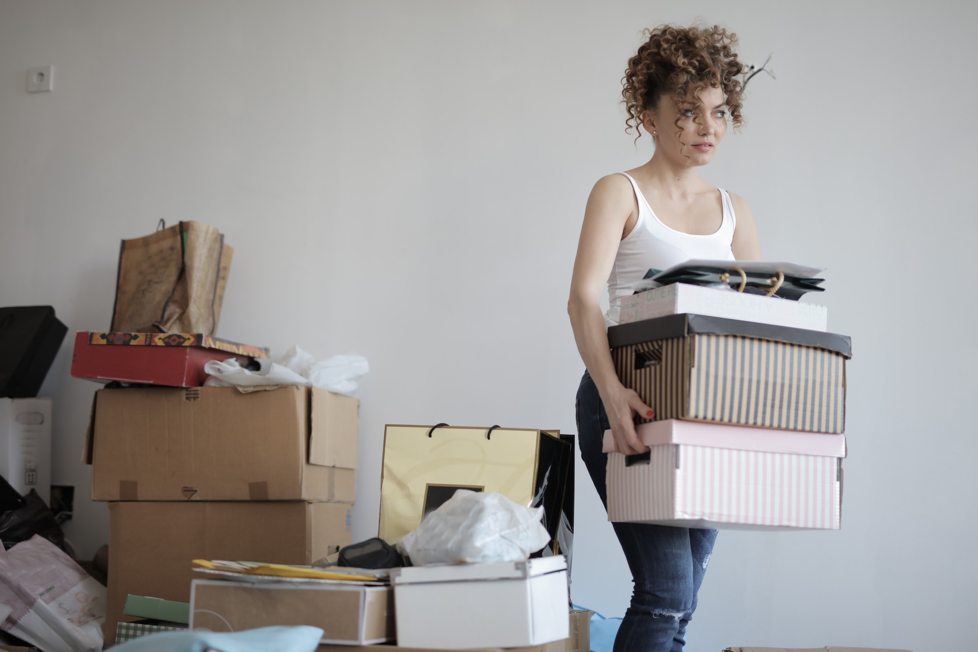 woman organizing boxes