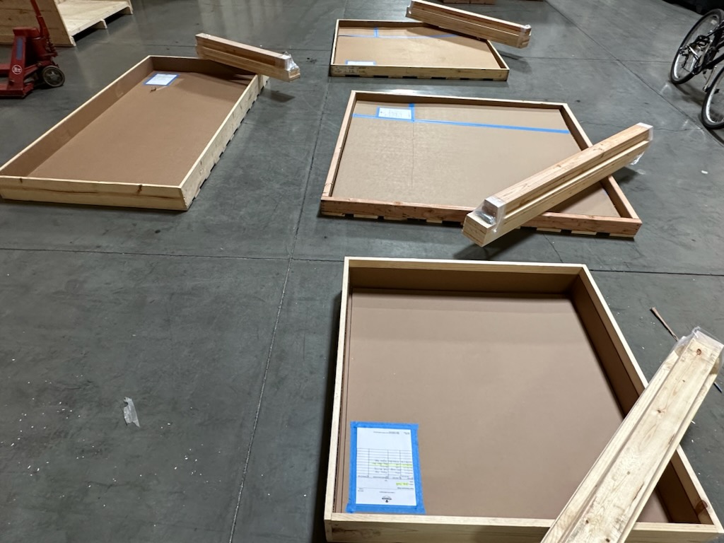 Multiple custom crates laying on the floor