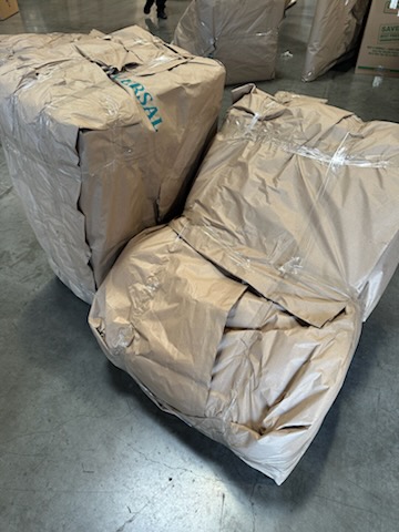 Overseas Shipping. Turner Moving & Storage wraps all items in paper pads before they are loaded into the lift van.
