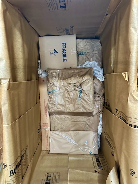 Overseas Shipping. Turner Moving & Storage wraps all items in paper pads before they are loaded into the lift van.