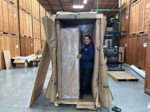 Loading items into a crate for overseas shipping