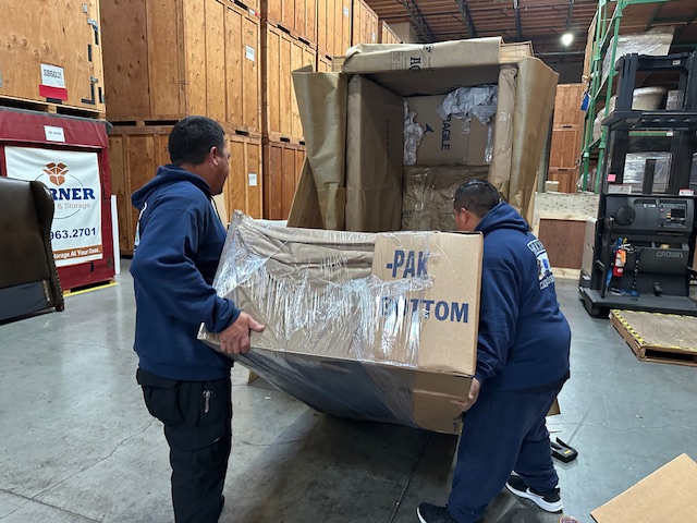 Loading items into a crate for overseas shipping